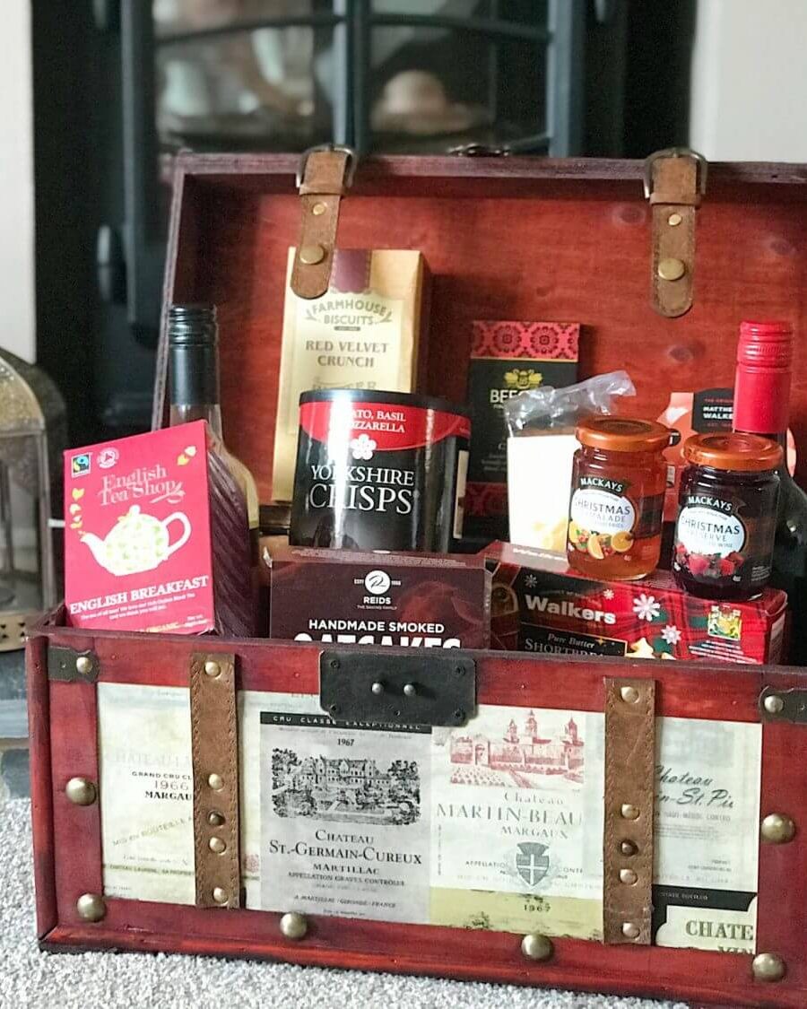 Christmas gift ideas: get a Prestige Christmas hamper filled with wine, biscuits, and chocolate.