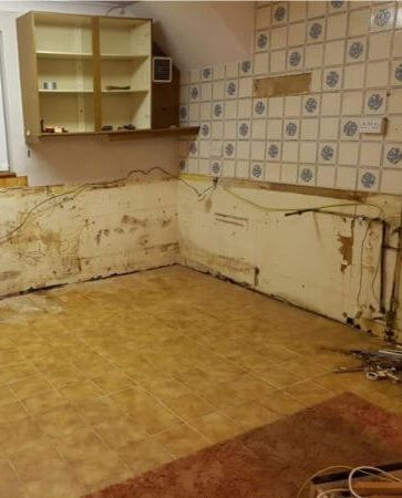 Our kitchen with the old kitchen taken out with original tiles