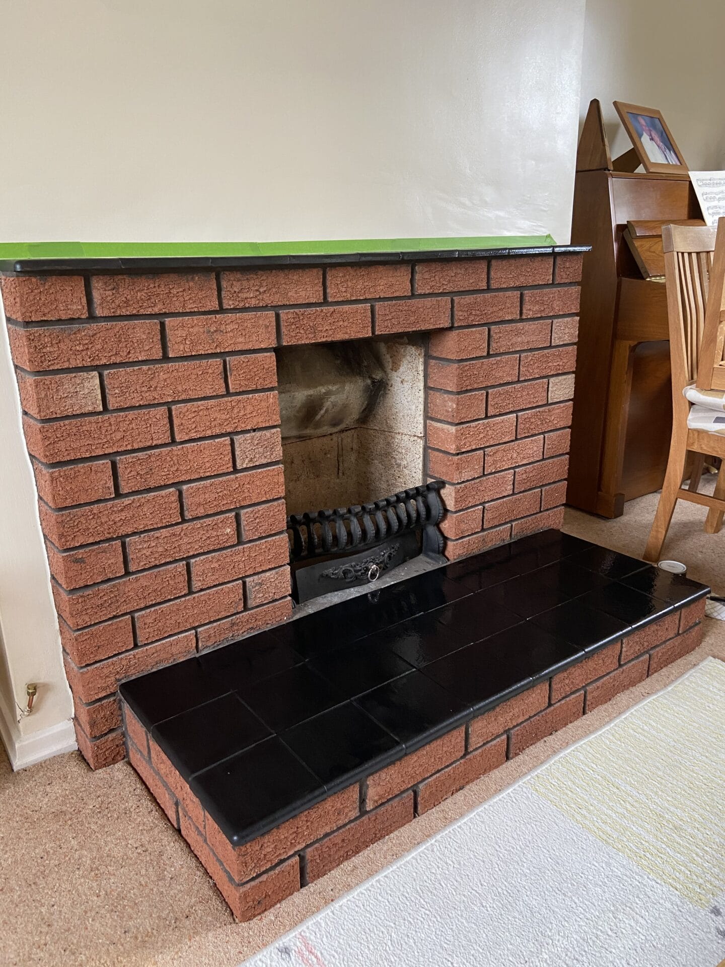 Coat one on the fireplace
