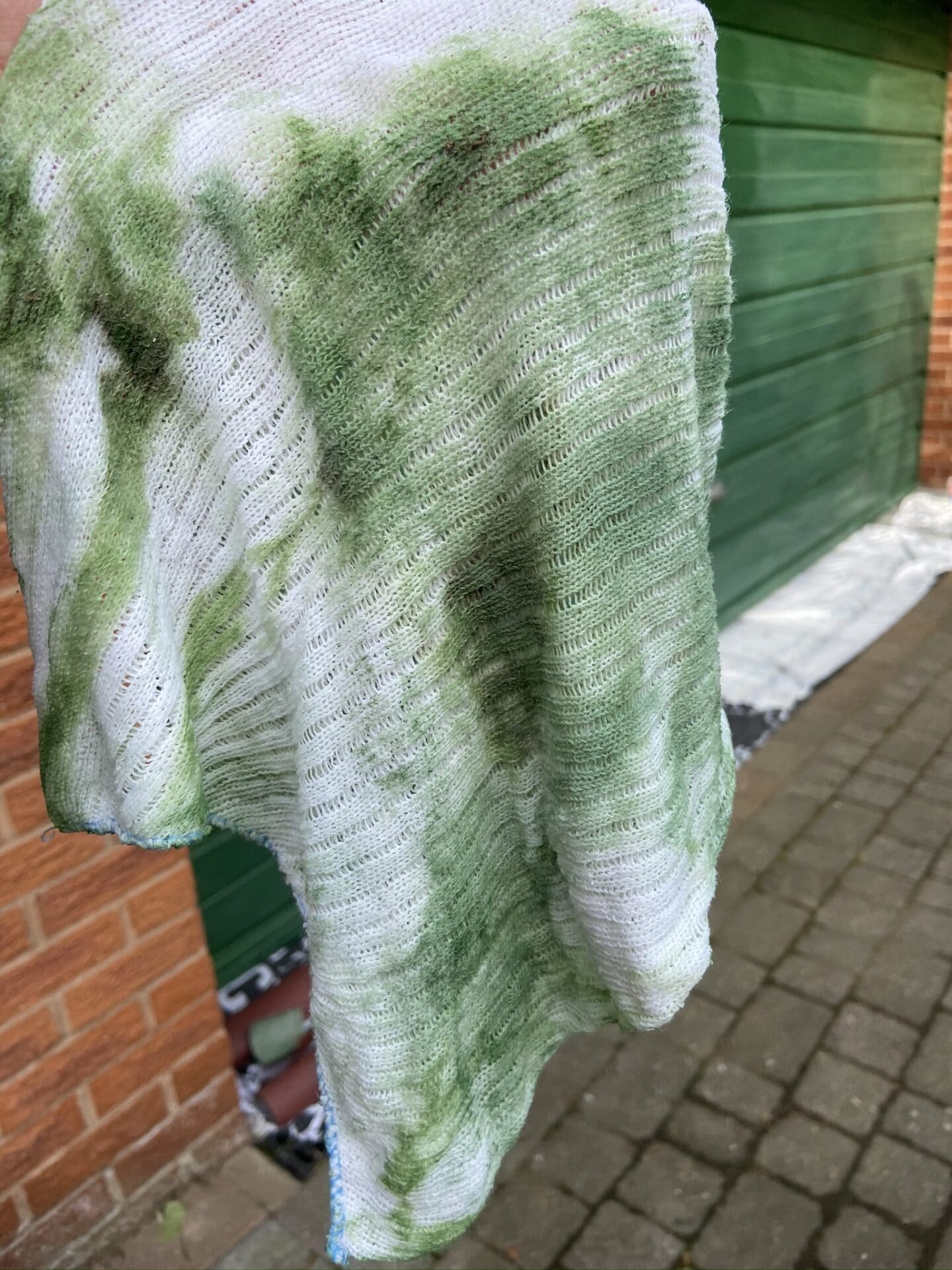 Colour of my cloth after sanding and cleaning the garage door