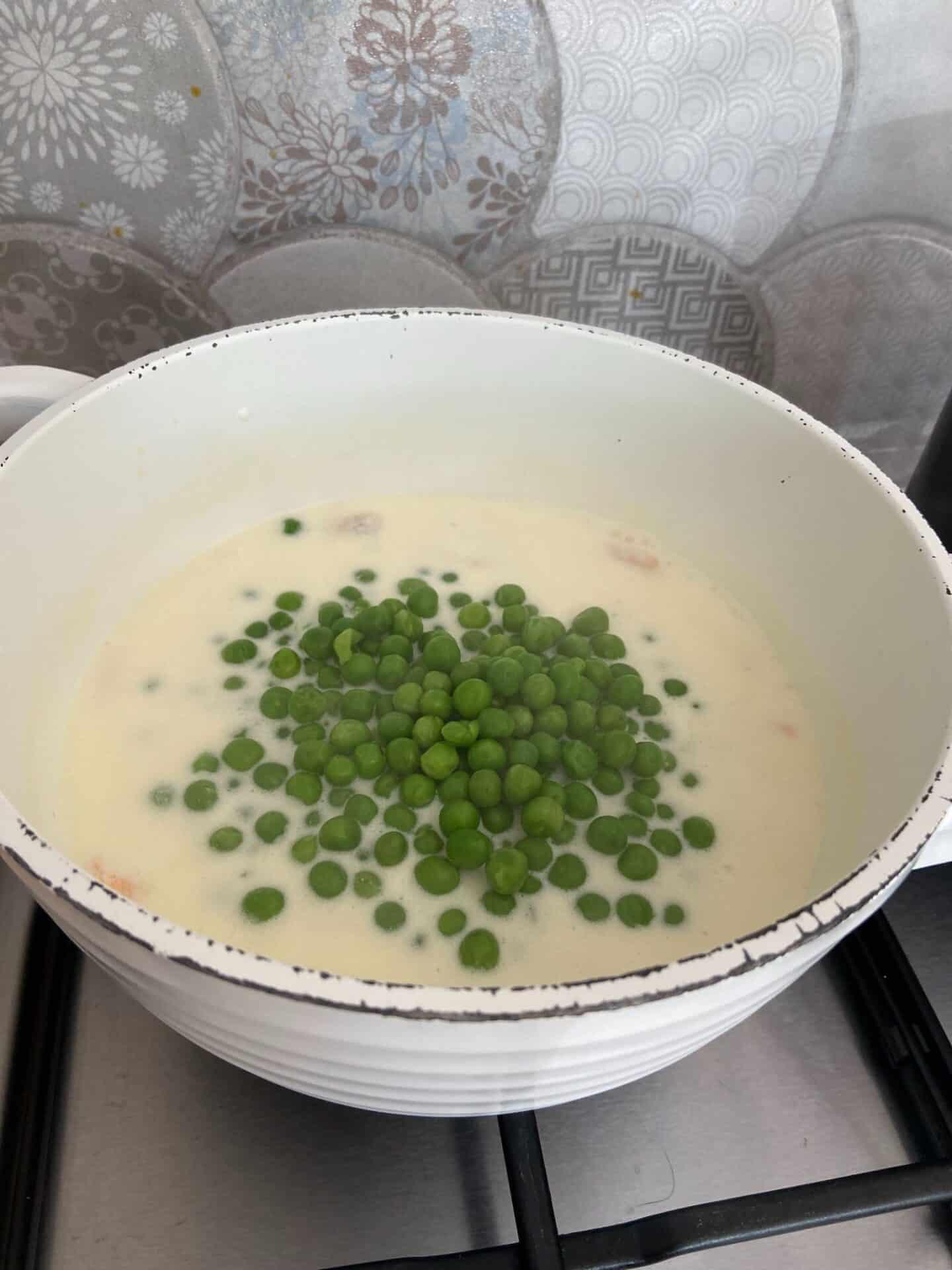 Frozen peas added to the creme fraiche mix