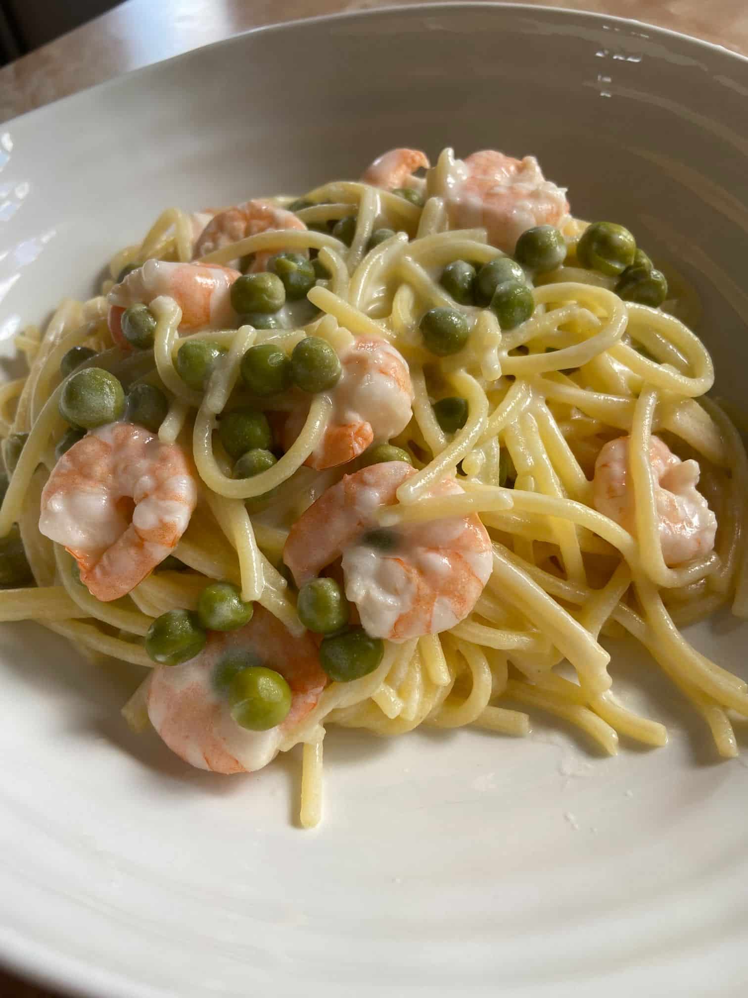 Finished prawn linguine served up in a bowl