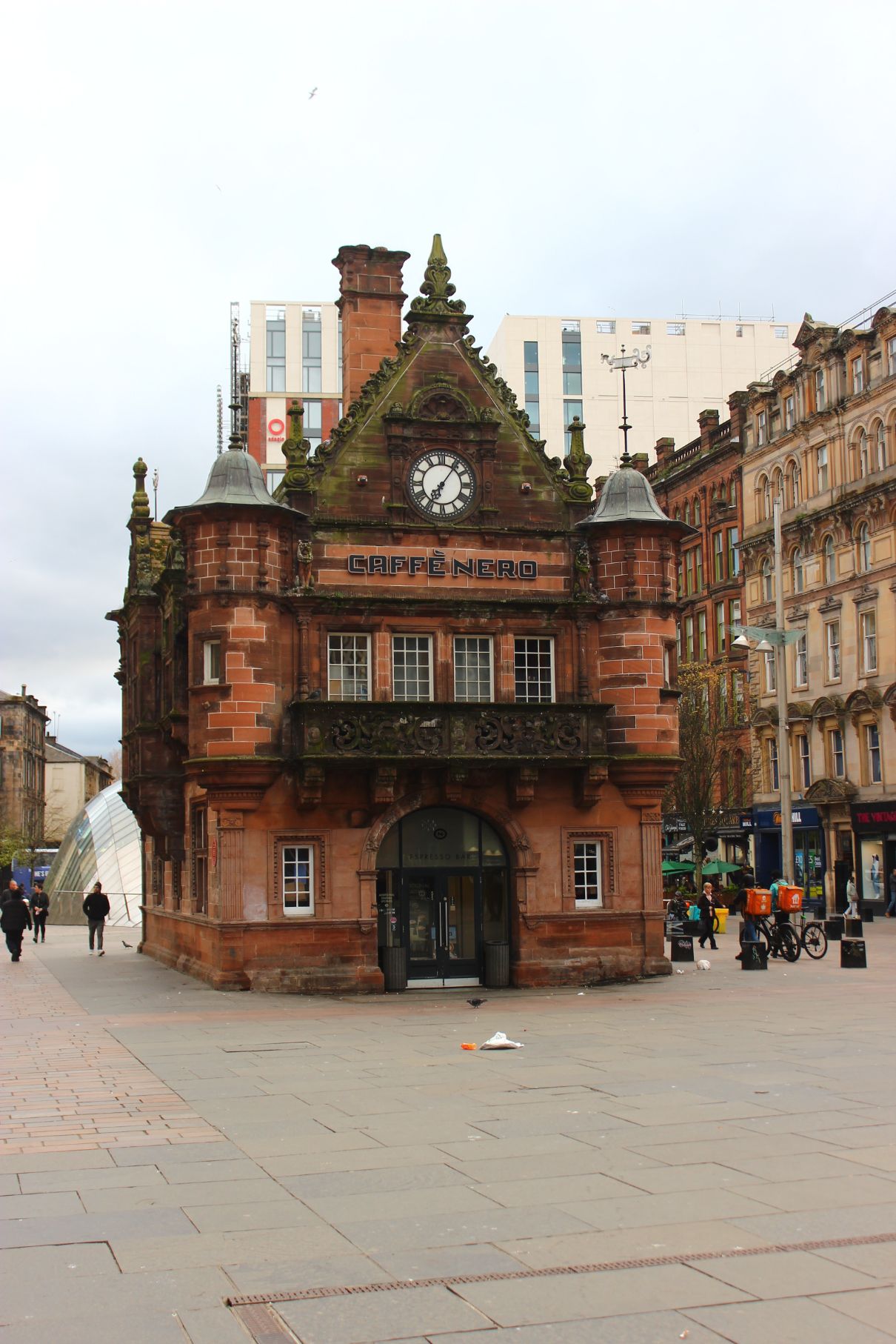 A Cafe Nero in London surrounded by housing and buildings