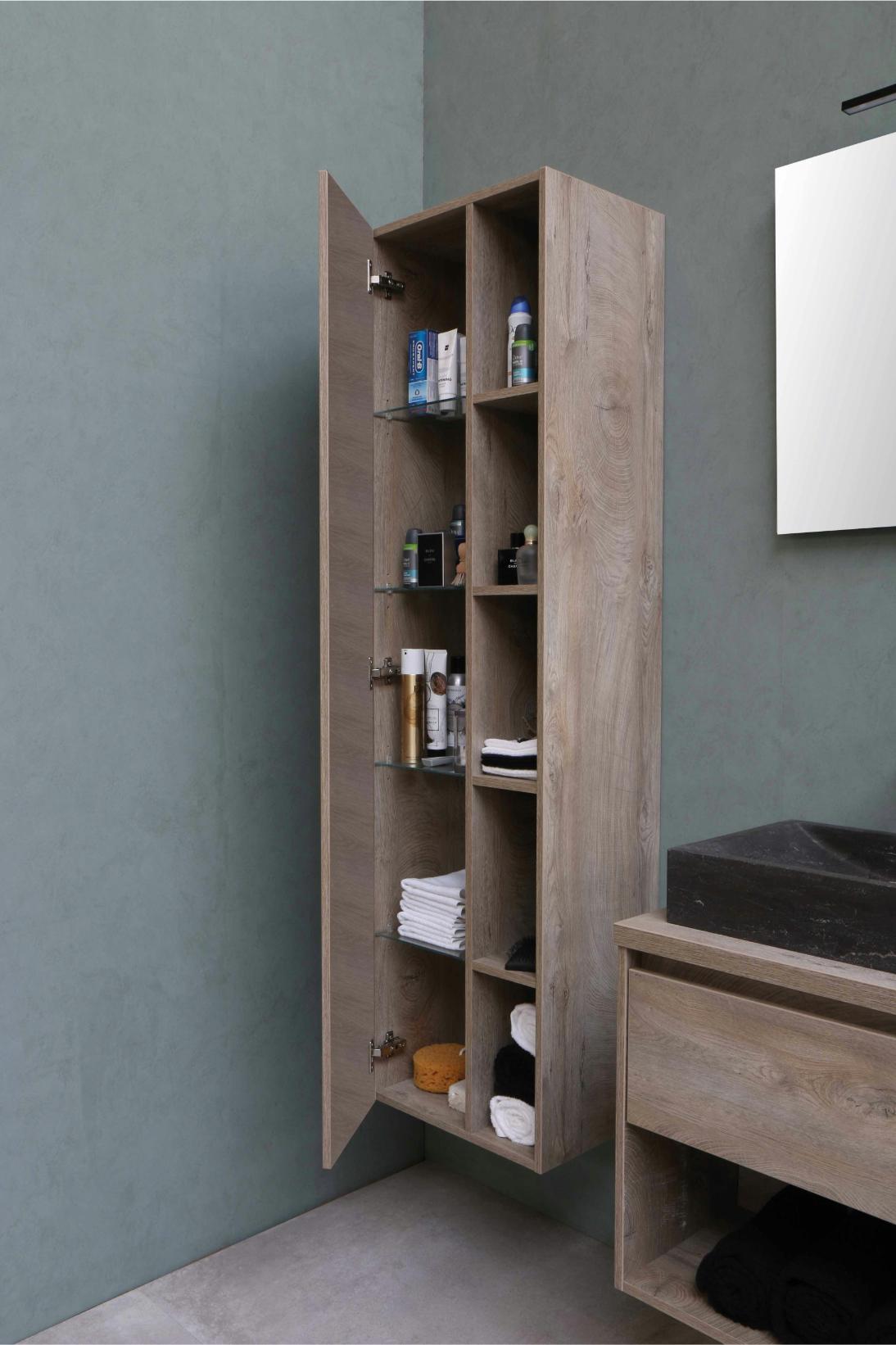 A corner unit in a bathroom to hold products and hygiene items