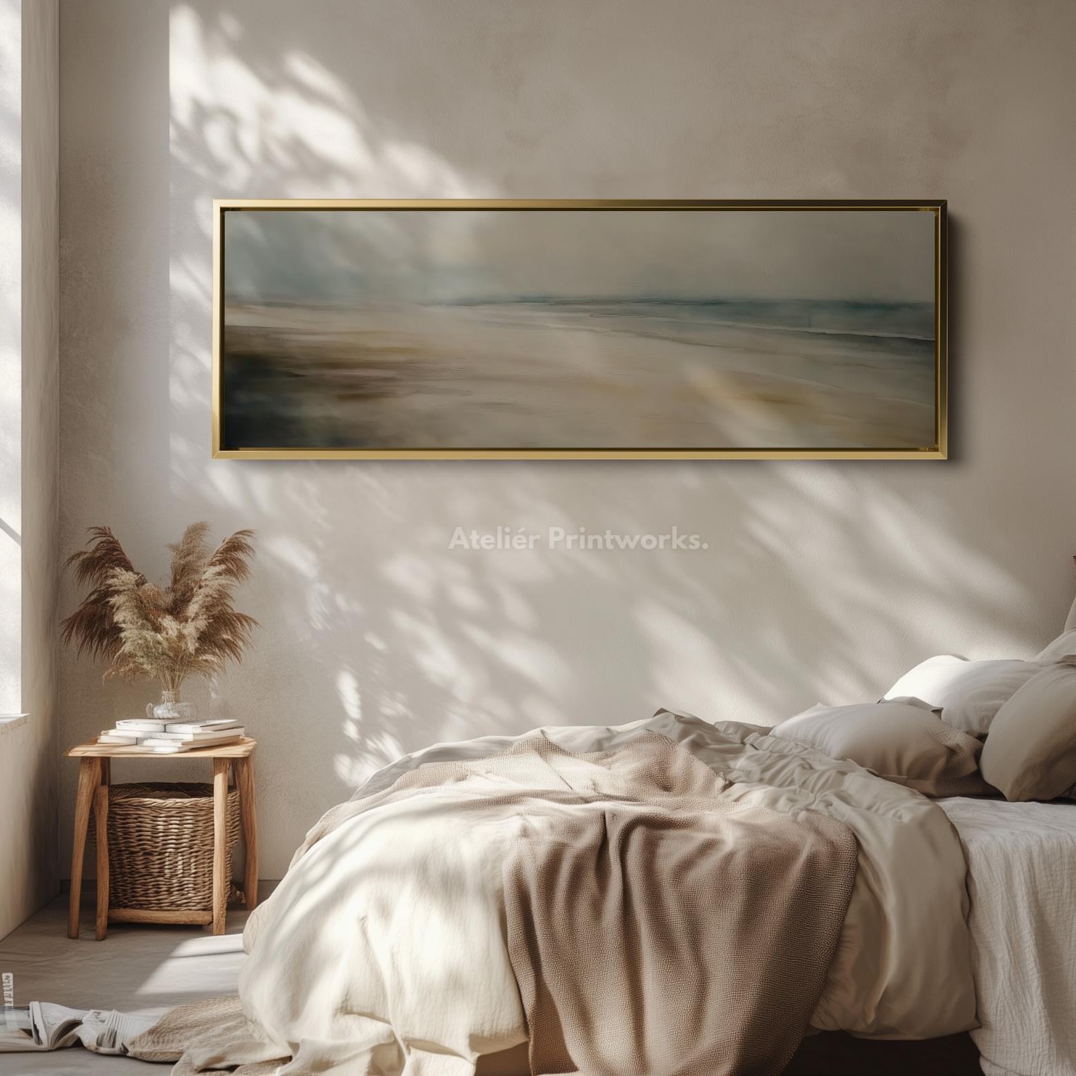 Sun shining into a bedroom with a horizontal photo on the wall