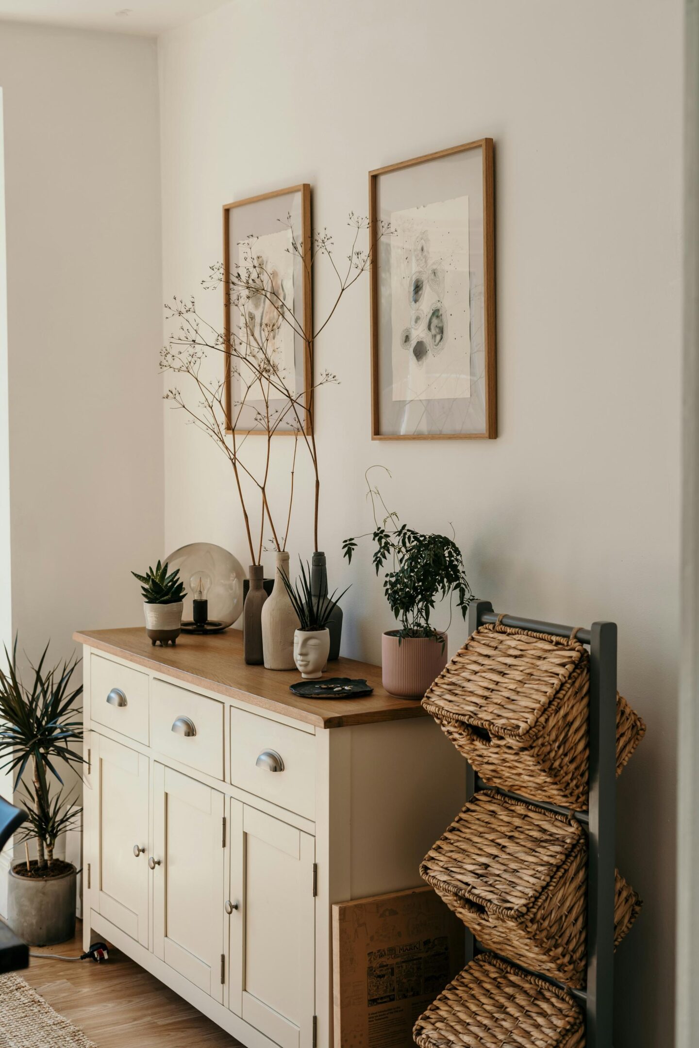 A sideboard that has a collection of items displayed on the top